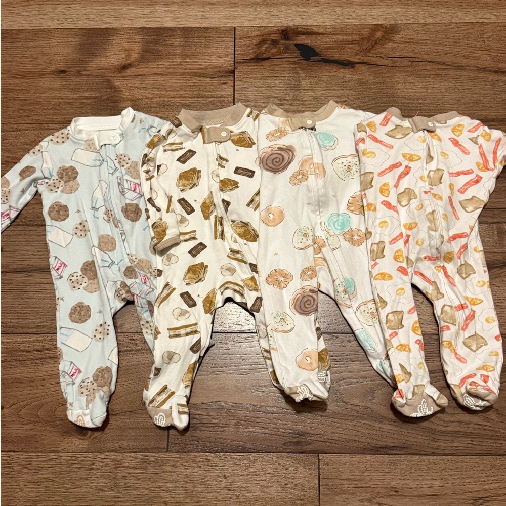 Burt’s Bee set of 4 footies. Size 0-3 months